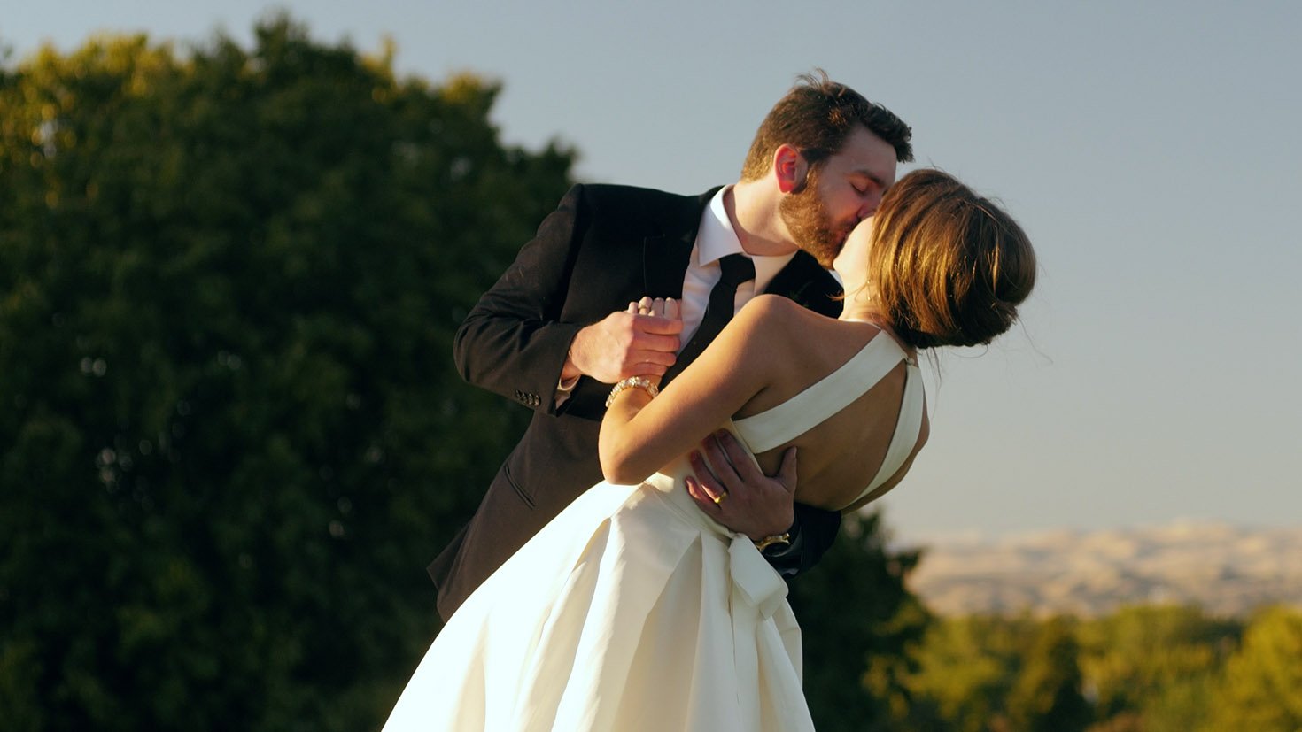 Bride and Groom Kiss - Wedding Videographer